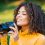 young-pretty-african-woman-in-yellow-takes-picture-2023-11-27-05-00-24-utc_11zon.jpg
